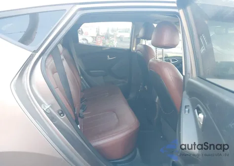 2012 Hyundai Tucson Limited z USA, uszkodzony, nr VIN KM8JU3AC7CU522152